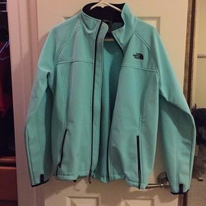 Teal soft shell north face jacket